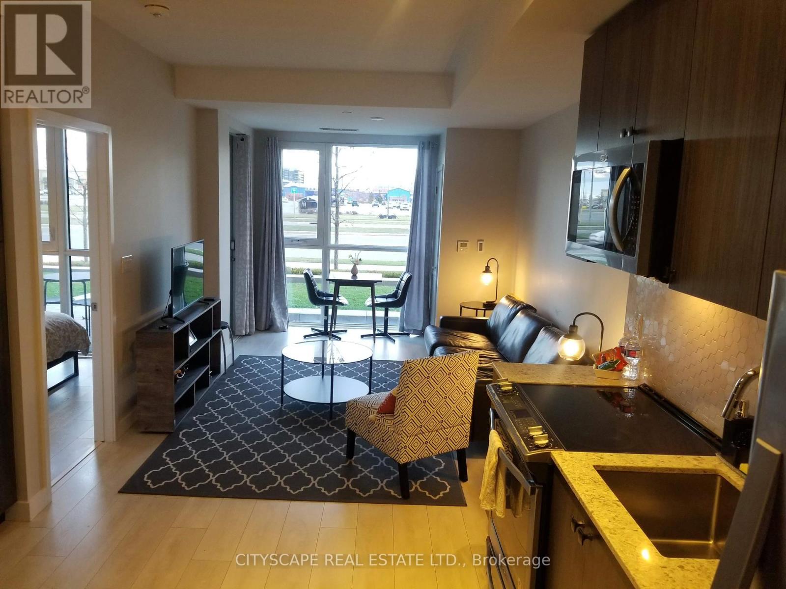 119 - 210 Sabina Drive, Oakville, Ontario  L6H 0W6 - Photo 2 - W12070712