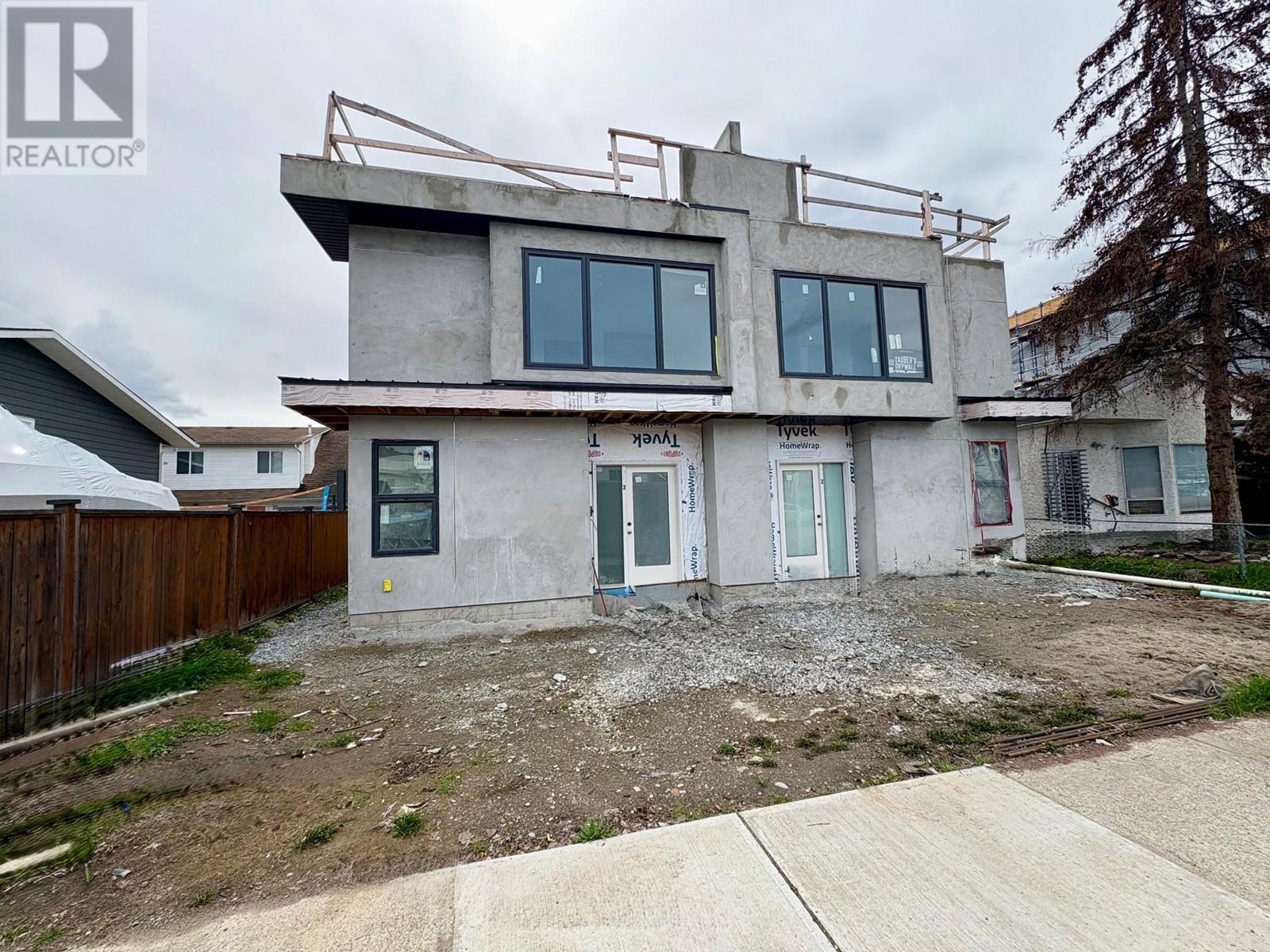 943 Fuller Avenue Unit# 1-4, Kelowna, British Columbia  V1Y 6X5 - Photo 1 - 10342564