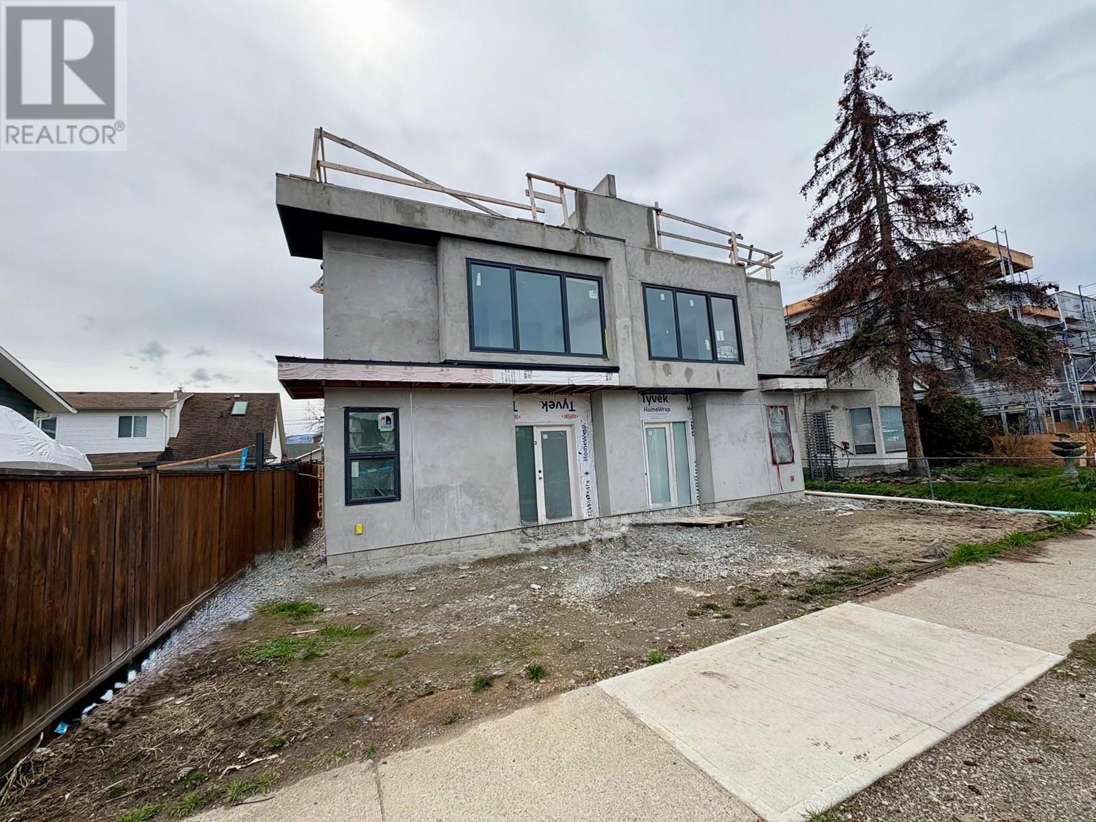 943 Fuller Avenue Unit# 1-4, Kelowna, British Columbia  V1Y 6X5 - Photo 2 - 10342564