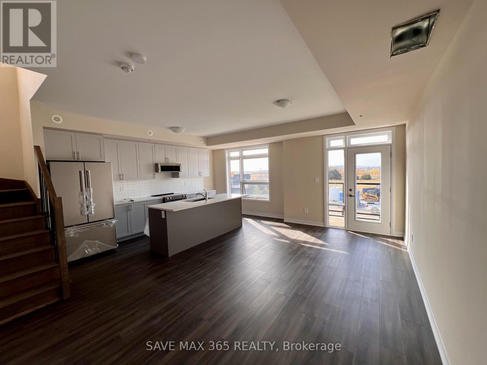 Property at 103 - 1565 ROSE WAY image 3