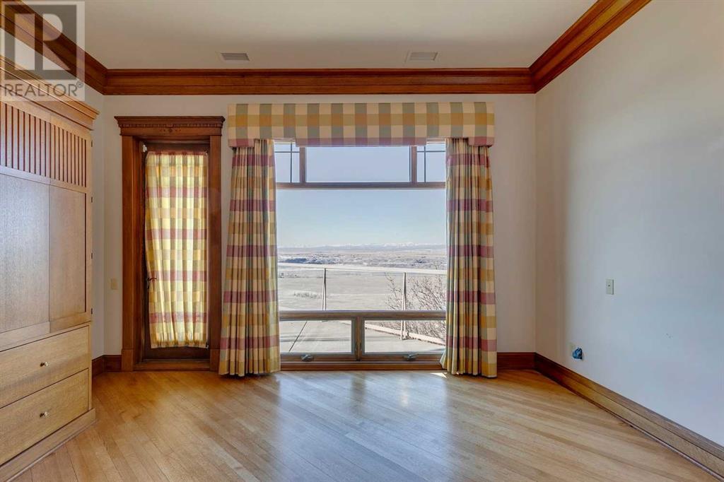 76 Bearspaw Pointe Way, Rural Rocky View County, Alberta  T3L 2P6 - Photo 21 - A2206033