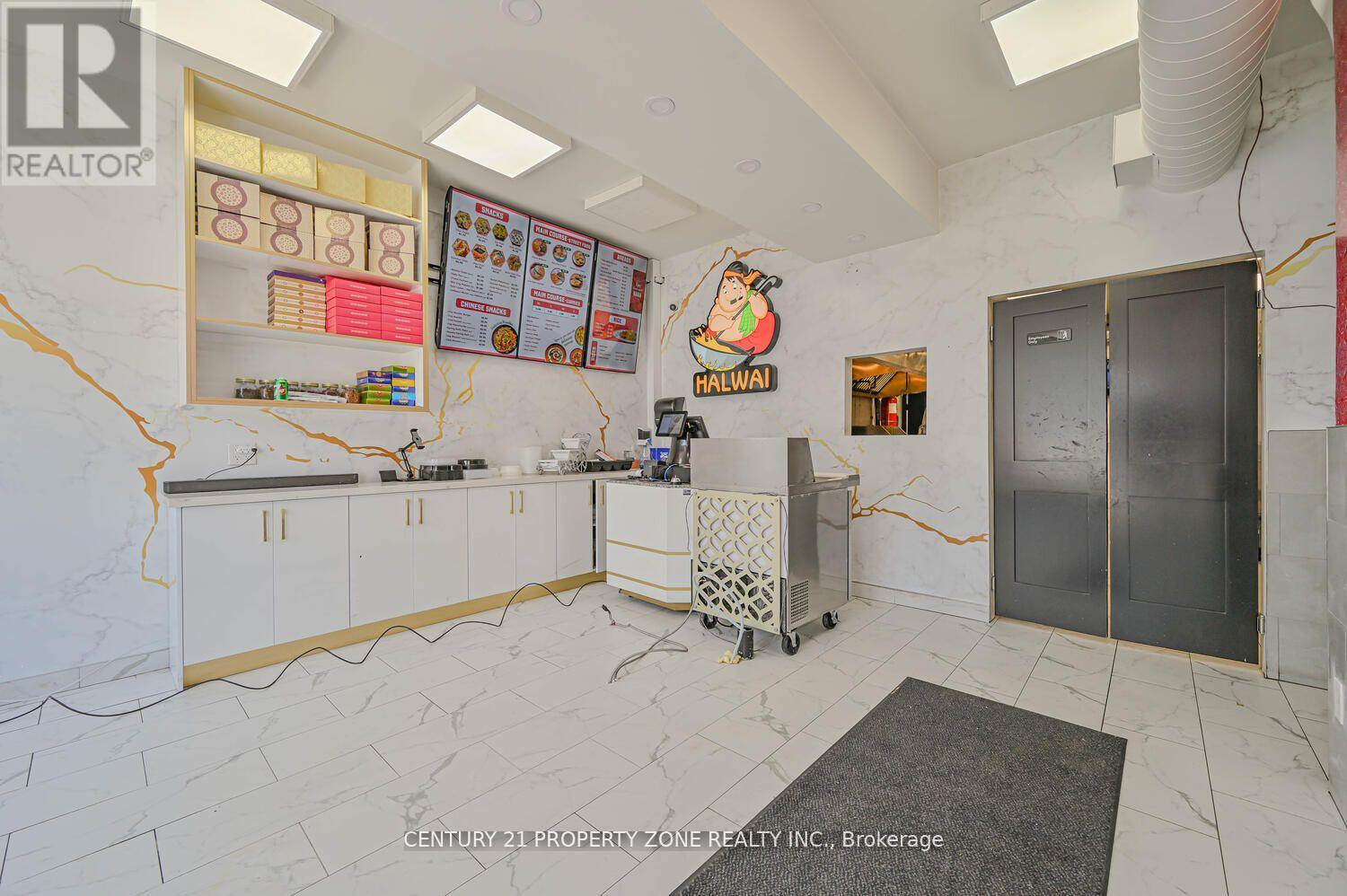 1 - 212 Queen Street E, Brampton, Ontario  L6V 1W2 - Photo 12 - W12075205