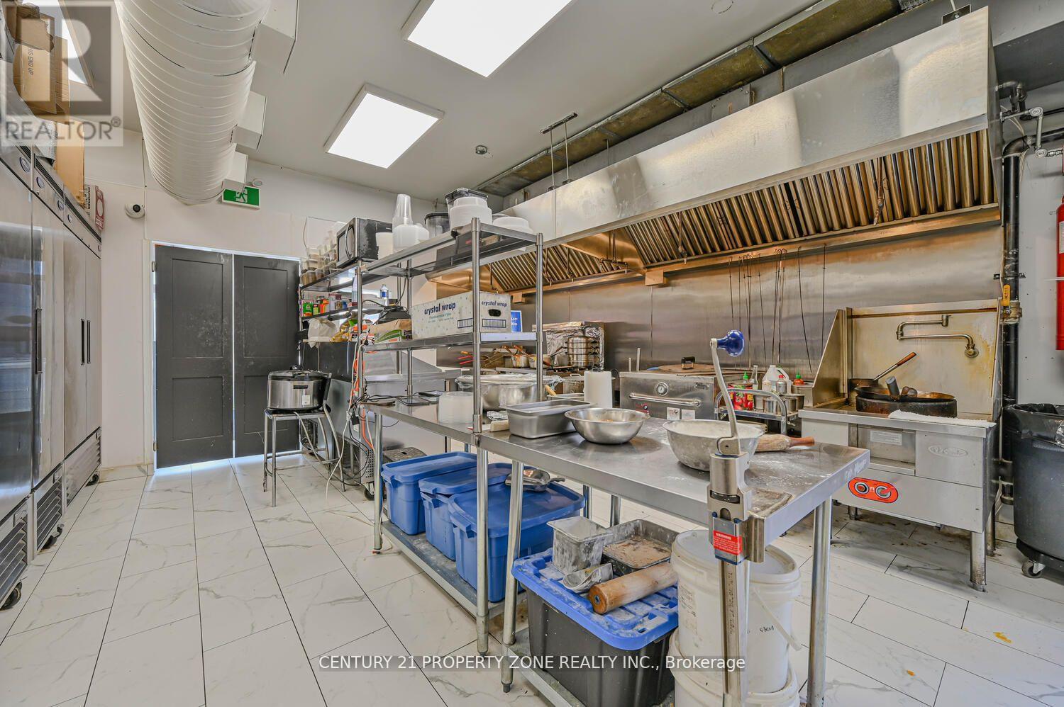 1 - 212 Queen Street E, Brampton, Ontario  L6V 1W2 - Photo 23 - W12075205