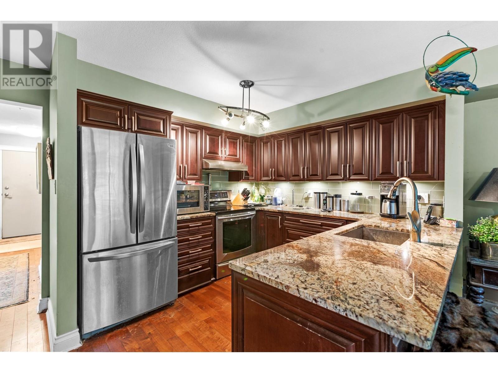 101 180 Ravine Drive, Port Moody, British Columbia  V3H 4Z3 - Photo 12 - R2988561