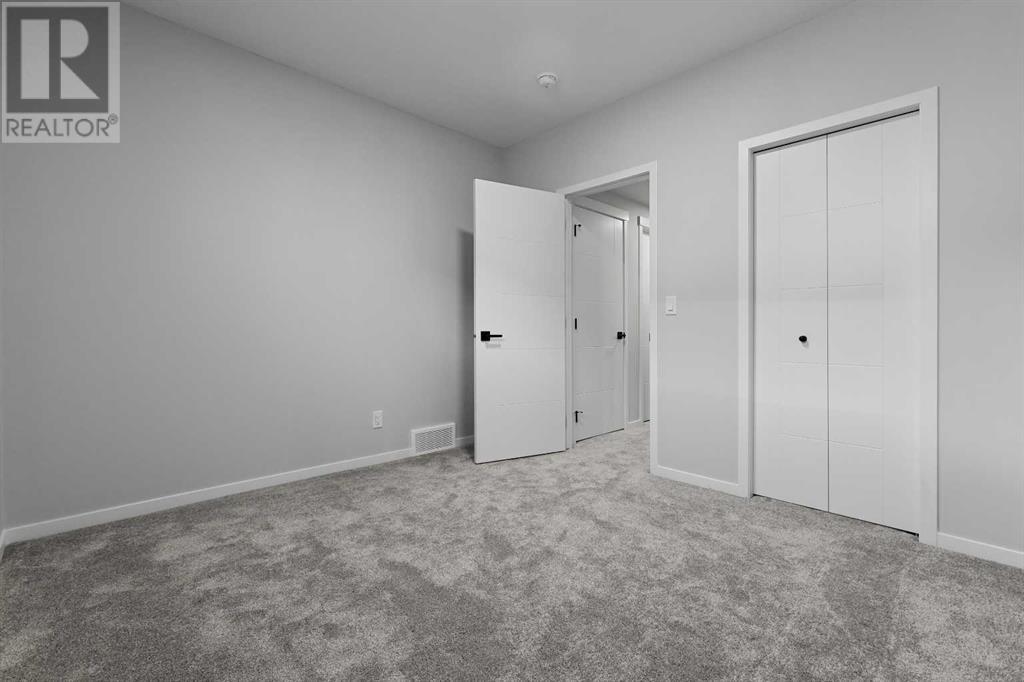 84 Rowmont Drive Nw, Calgary, Alberta  T3L 0J4 - Photo 41 - A2210021