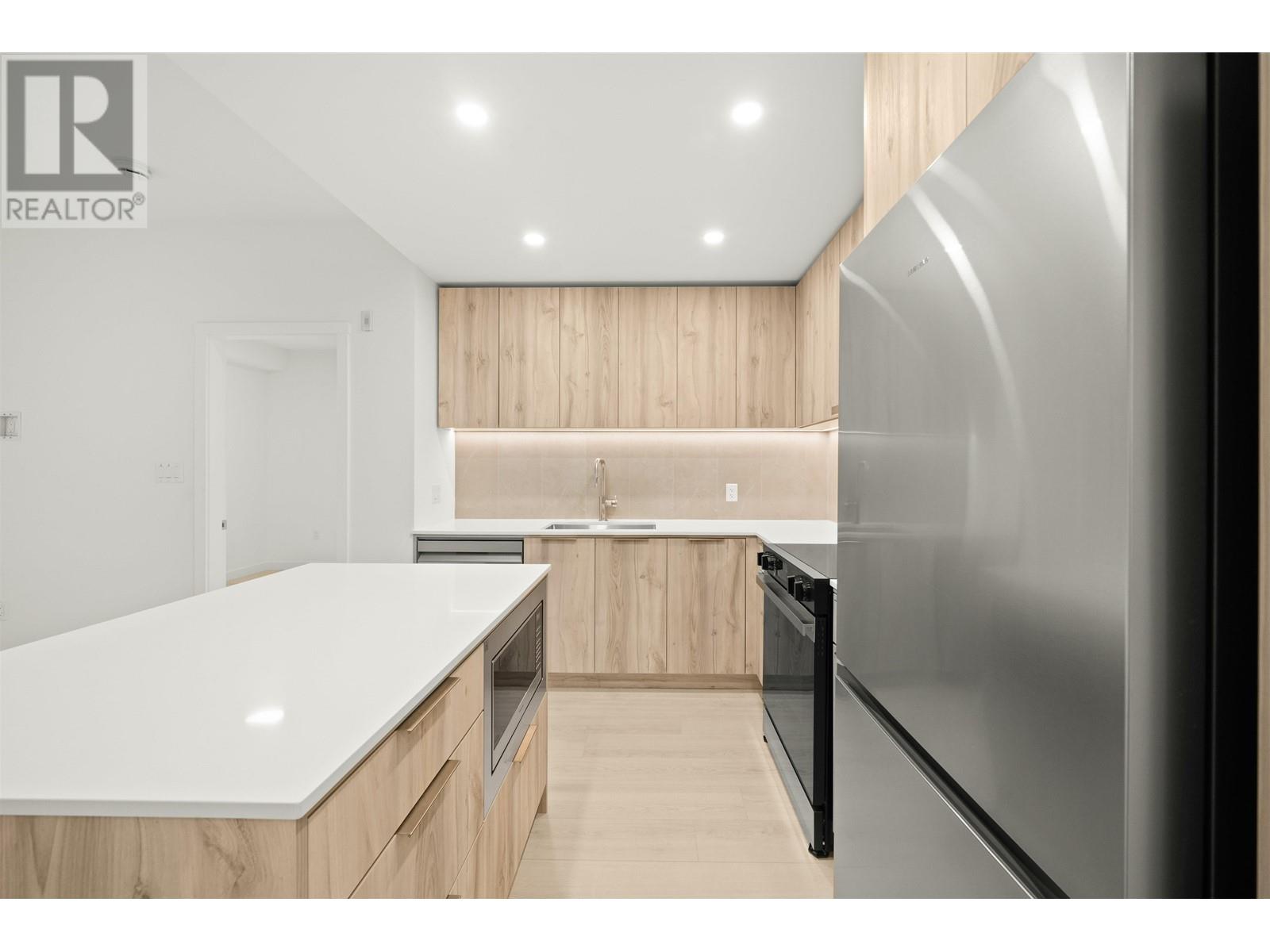 405 3596 Malsum Drive, North Vancouver, British Columbia  V7G 0B5 - Photo 3 - R2989109