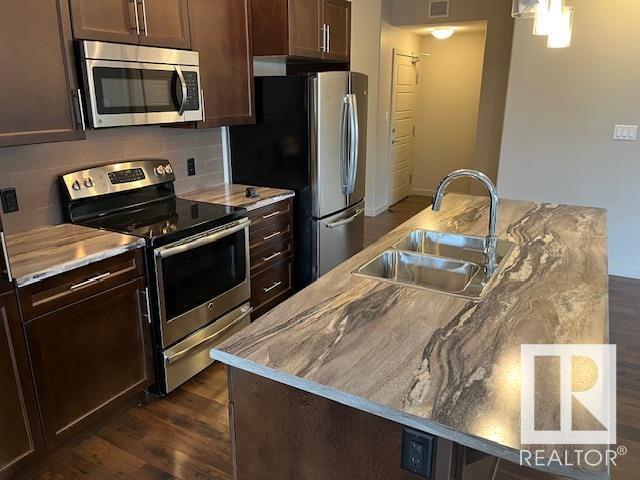 Property at #201 507 ALBANY WY NW image 2