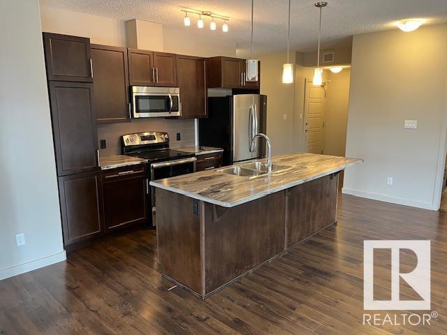 Property at #201 507 ALBANY WY NW image 3