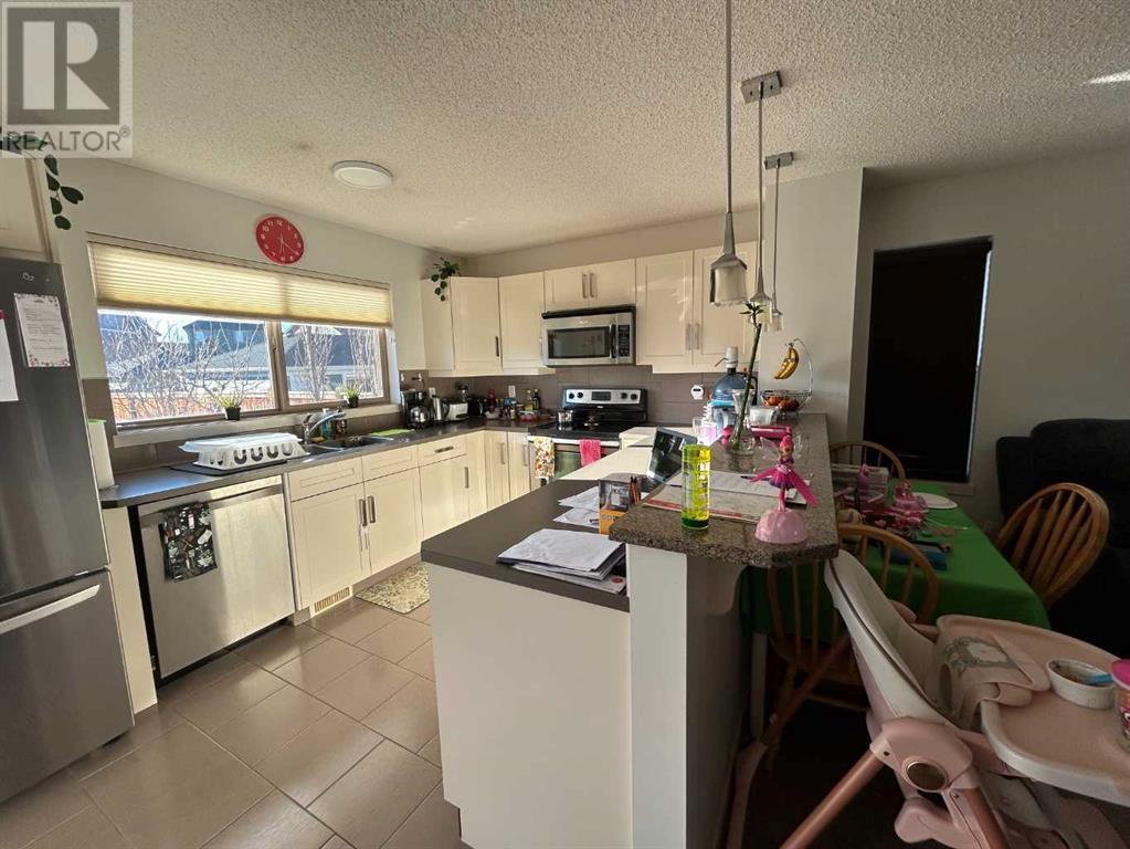 171 89 Street Sw, Calgary, Alberta  T3H 0M4 - Photo 7 - A2204726
