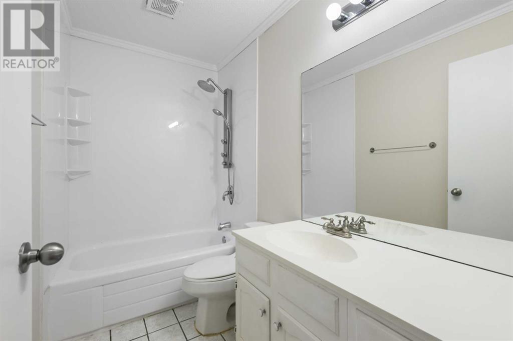 1067 Acadia Drive Se, Calgary, Alberta  T2J 0E4 - Photo 19 - A2208663