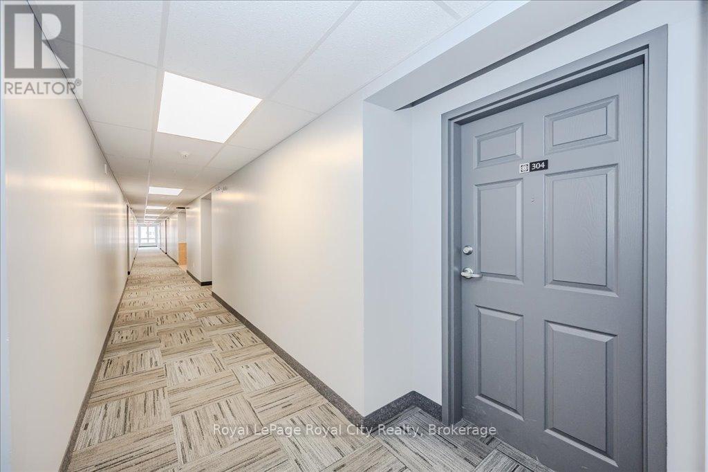 304 - 19 Waterford Drive, Guelph, Ontario  N1L 0G8 - Photo 4 - X12077252