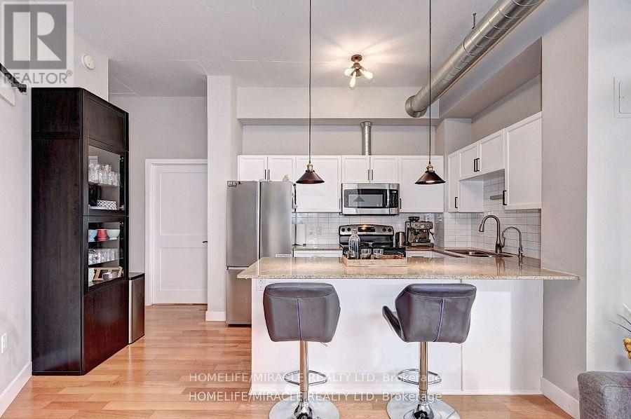 203 - 42 Bridgeport Road E, Waterloo, Ontario  N2J 0B3 - Photo 13 - X12077303