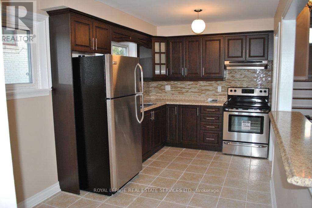 1 - 67 Lanyard Road, Toronto, Ontario  M9M 1Y8 - Photo 5 - W12077853