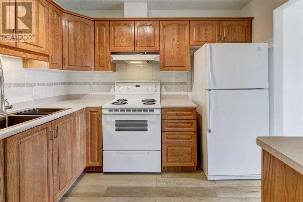Property at 309, 3309 Hawksbrow Point NW image 5