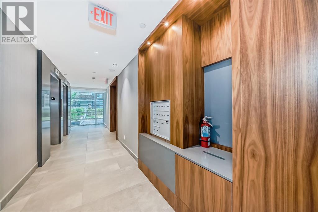 201, 88 Waterfront Mews Sw, Calgary, Alberta  T2P 1K7 - Photo 3 - A2205255