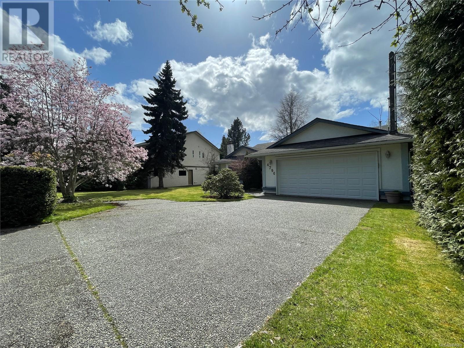 Property at 4790 Cordova Bay Rd image 1