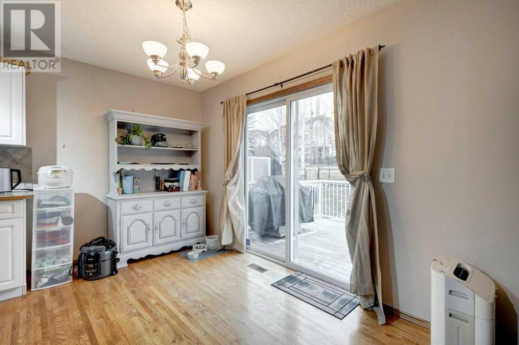 89 Tuscany Meadows Close Nw, Calgary, Alberta  T3L 2M8 - Photo 7 - A2207395