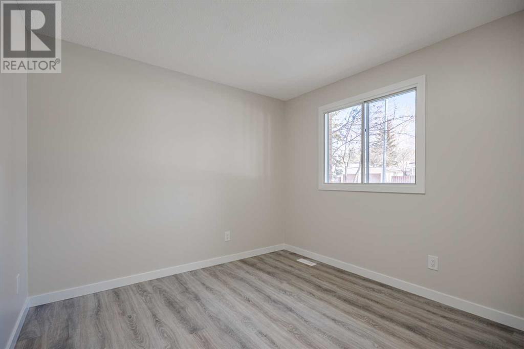 5835 Dalcastle Drive Nw, Calgary, Alberta  T3A 1Z2 - Photo 4 - A2206265