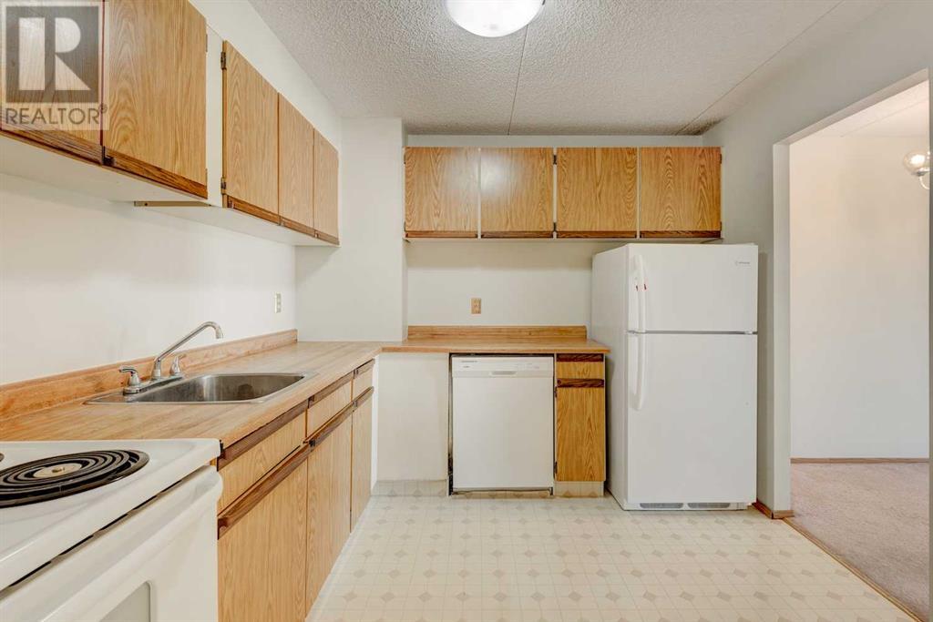 504, 5204 Dalton Drive Nw, Calgary, Alberta  T3A 3H1 - Photo 6 - A2210026