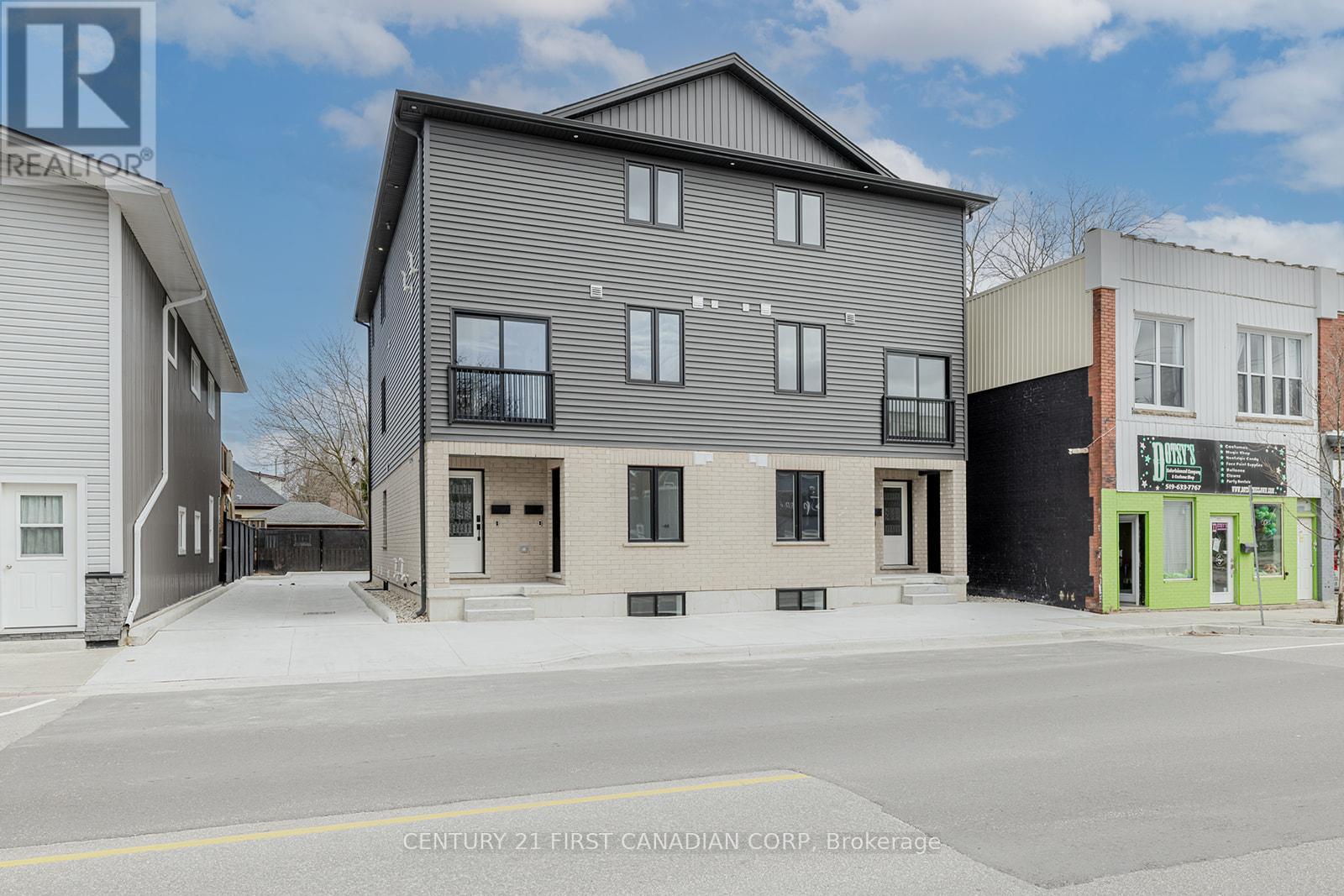 109 Ross Street St. Thomas, Ontario Brand new purpose-built 4-plex in the growing city of St. Thomas, just minutes to London, the 401, and a short drive to Port Stanley beaches. With major employers like the new VW EV battery plant and Amazon fulfillment center, St. Thomas is experiencing rapid growth making this is a smart investment or ideal multi-generational living option. Each side-by-side unit offers a mirrored main-floor unit with 3 bedrooms, 2.5 baths, open-concept layout, and walkout to the rear parking. Upper units feature 3 bedrooms plus a den, 2.5 baths, and scenic top-floor views. All four units boast high ceilings, quartz countertops, upgraded lighting, separate laundry, and brand new, never-used appliances. Separately metered and completely vacant, the building offers 5 rear parking spaces and 2 sewer and water connections. With market rental rates estimated at $2,600/month per upper & $2300 /month per lower, this property projects a strong 6.9% cap rate an ideal opportunity for investors looking to secure cash flow in a high-demand rental market. (id:48254)