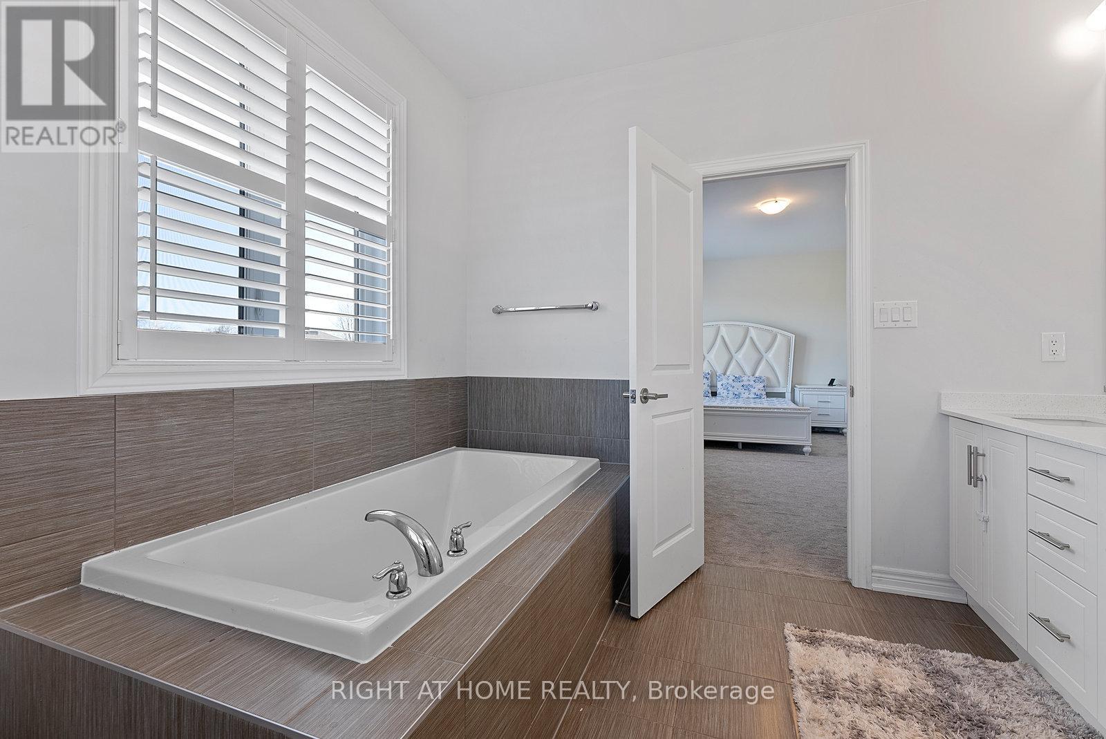 90 Spitfire Drive, Hamilton, Ontario  L0R 1W0 - Photo 23 - X12080447