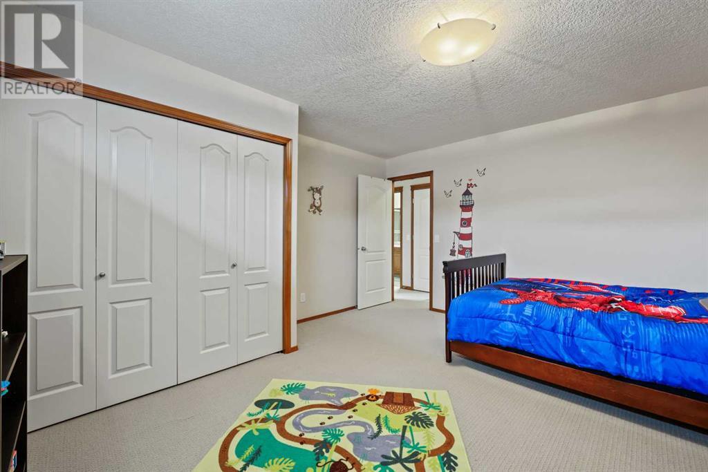 614 Rocky Ridge View Nw, Calgary, Alberta  T3G 5C2 - Photo 33 - A2203738