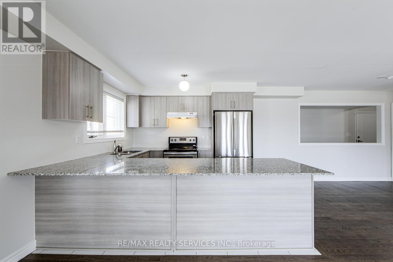 117 - 200 Veterans Drive, Brampton (Northwest Brampton), Ontario  L7A 4S6 - Photo 9 - W12081339