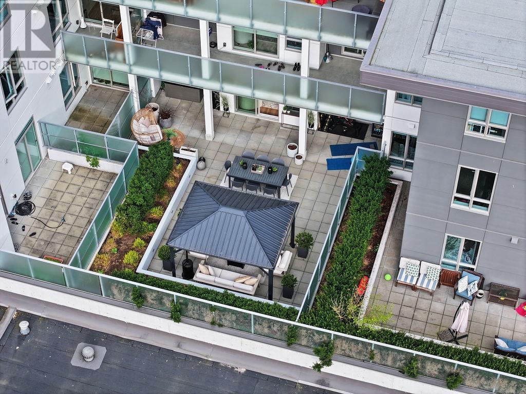 209 711 W 14th Street, North Vancouver, British Columbia  V7M 3E8 - Photo 2 - R2990138