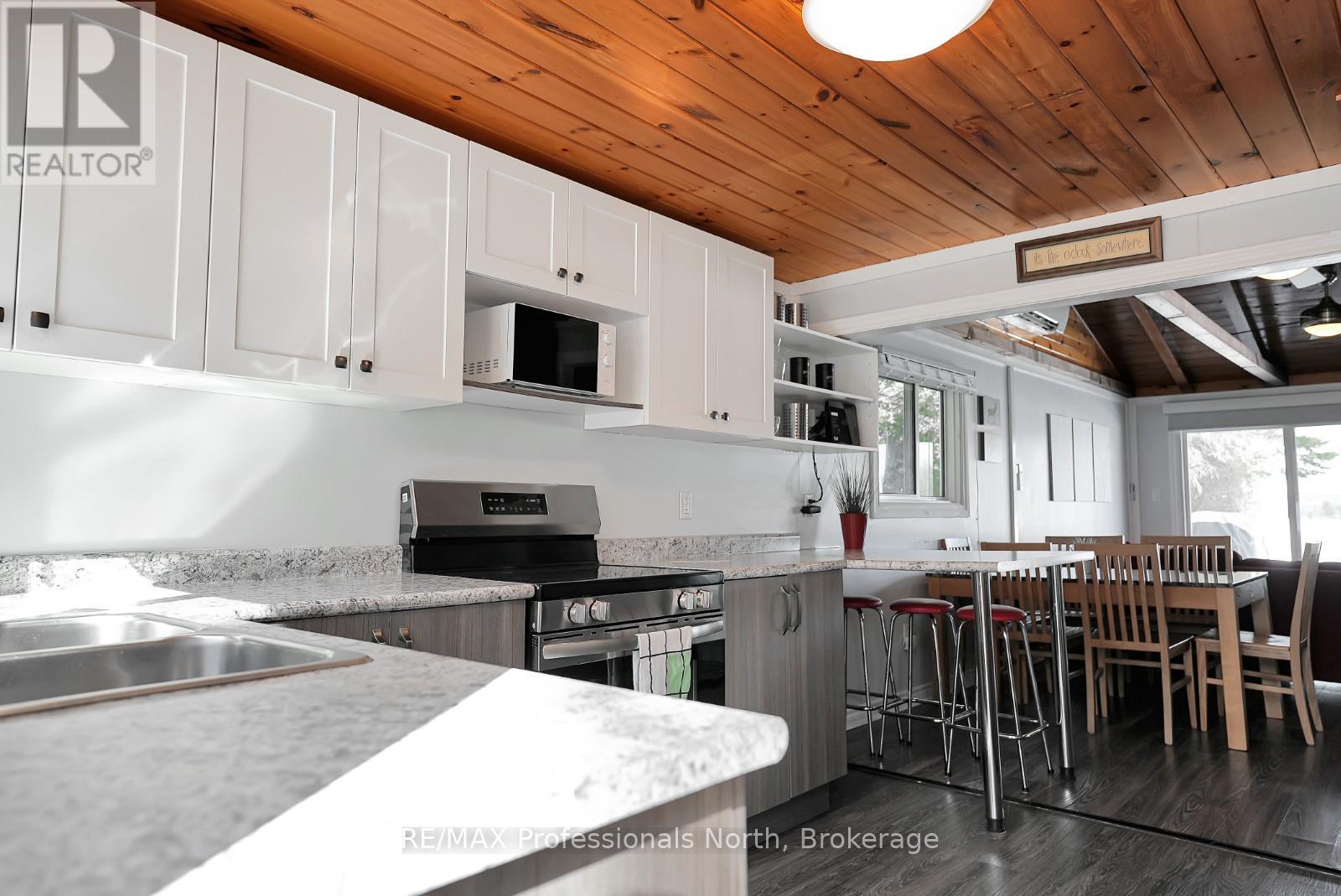 1024 Quail Run Lane, Minden Hills, Ontario  K0M 2K0 - Photo 6 - X12084081
