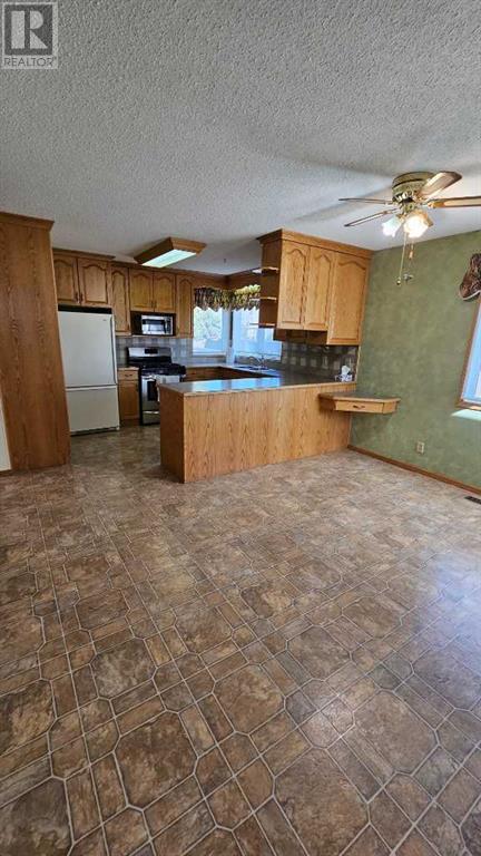 108 1 Avenue Ne, Milk River, Alberta  T0K 1M0 - Photo 3 - A2212045