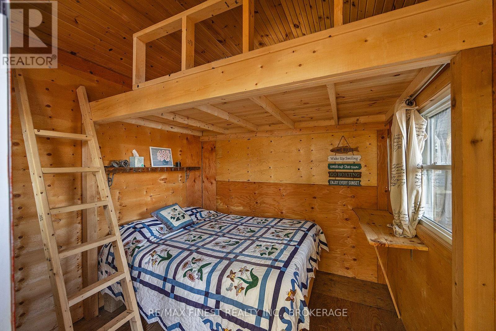 293 Gold Dust Lane, Frontenac (Frontenac South), Ontario  K0H 1W0 - Photo 31 - X12084617