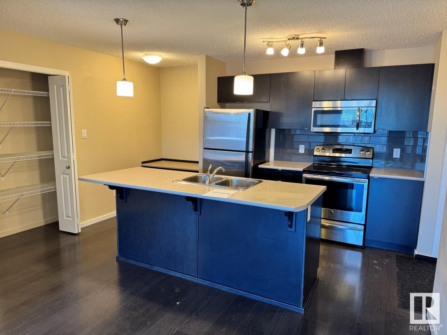 Property at #401 508 ALBANY WY NW image 3