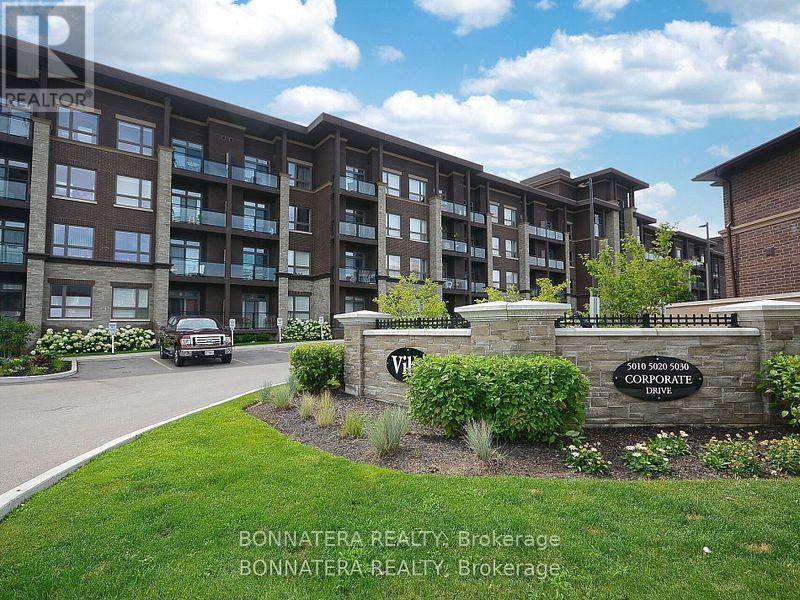 209 - 5010 Corporate Drive, Burlington (Uptown), Ontario  L7L 0H6 - Photo 1 - W12086221
