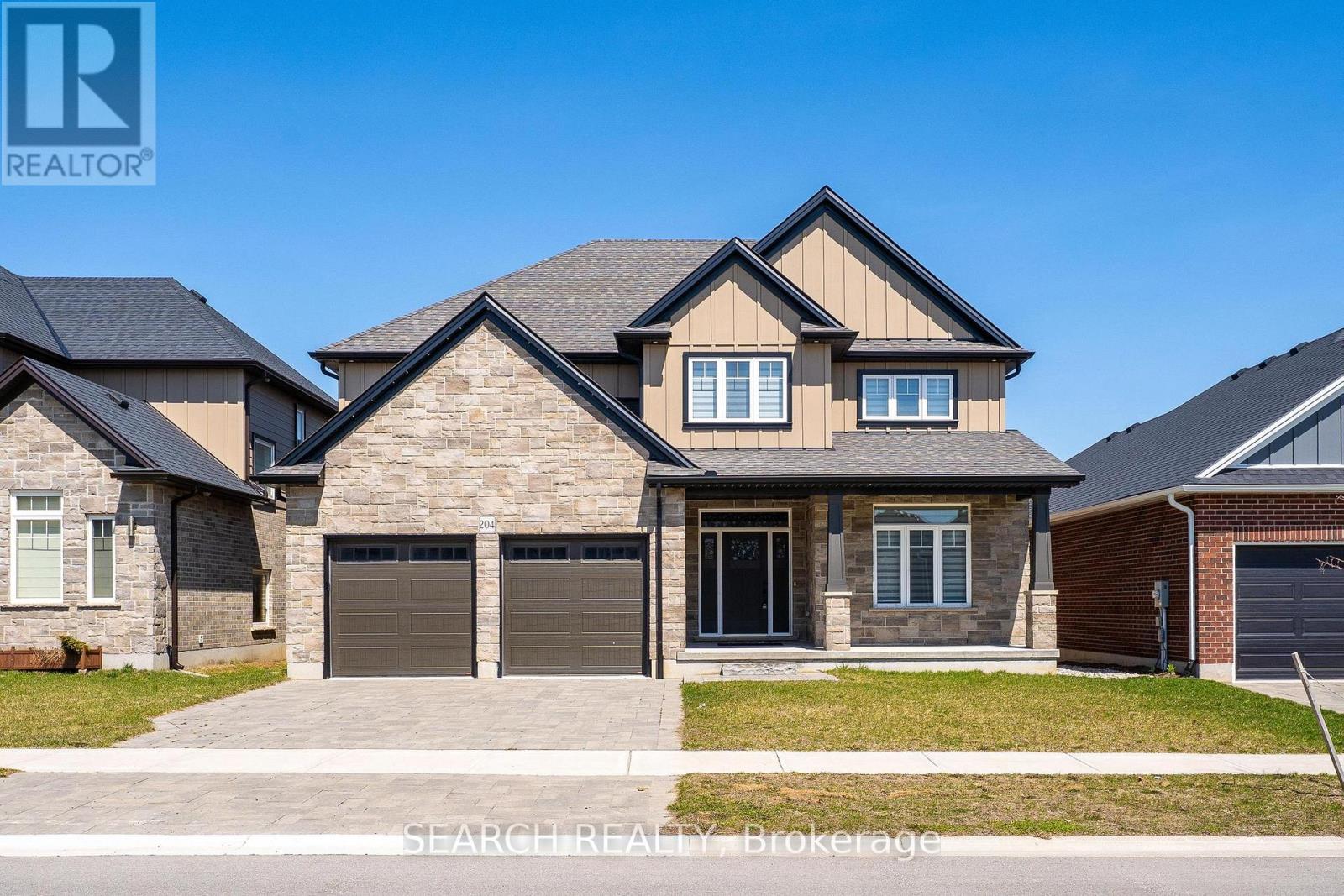 204 Boardwalk Way Thames Centre, Ontario Welcome to 204 Boardwalk Way Luxury Living in the Sought-After Boardwalk at Millpond Community. Step into refined elegance with this stunning 2,965 sq. ft. home built by Richfield Custom Homes, located in one of Dorchester's most prestigious neighbourhoods. Just minutes from Highway 401 (Exit 199), this property offers the perfect blend of quiet suburban charm and convenient access to major routes. Meticulous craftsmanship and upscale design throughout Spacious, open-concept Living and Dining area. Heart of the home is a chef's dream kitchen featuring luxurious quartz countertops, high-end JennAir appliances, and an expansive layout perfect for entertaining and gourmet cooking. Retreat to the primary bedroom suite, where you'll find his and hers walk-in closets and a spa-inspired ensuite complete with a freestanding soaker tub, a tiled glass shower, and a double vanity with top-tier finishes throughout. Prime location in a family-friendly, nature-surrounded community. Close proximity to all amenities. (Minutes away from Shoppers, Pizza Hut, Tim Hortons, McDonalad's etc.) (id:48254)