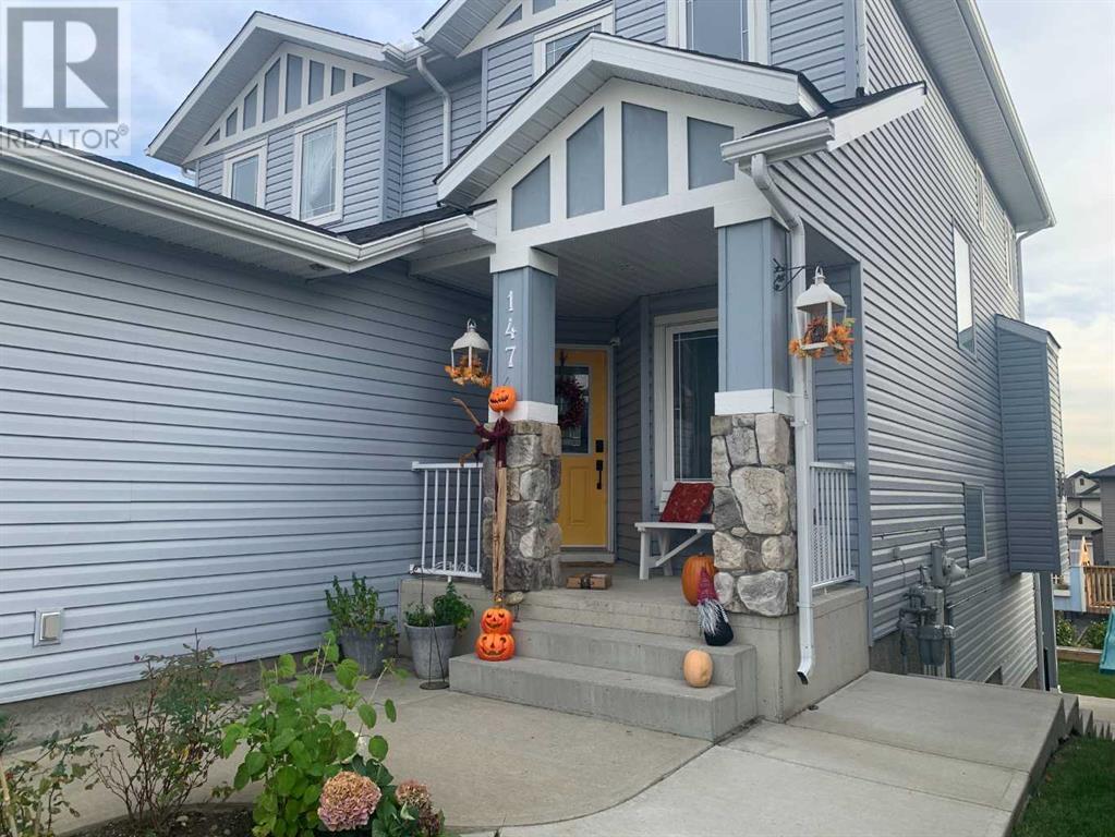 147 Sunset Close, Cochrane, Alberta  T4C 0B1 - Photo 3 - A2189094