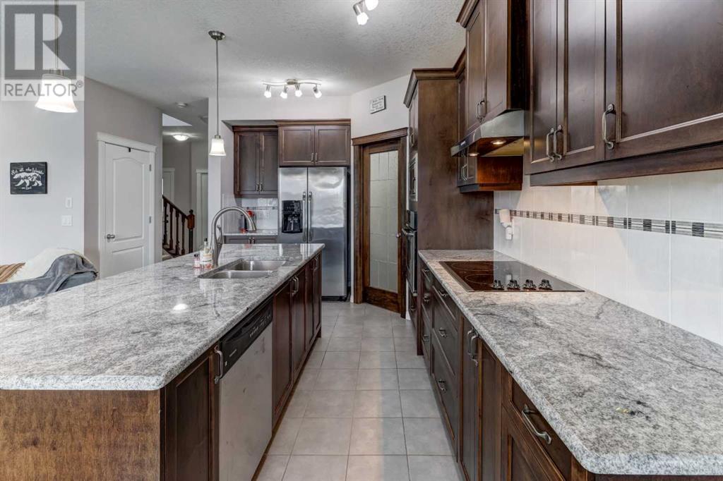 1048 Hillcrest Lane E, Airdrie, Alberta  T4B 3R6 - Photo 6 - A2207263