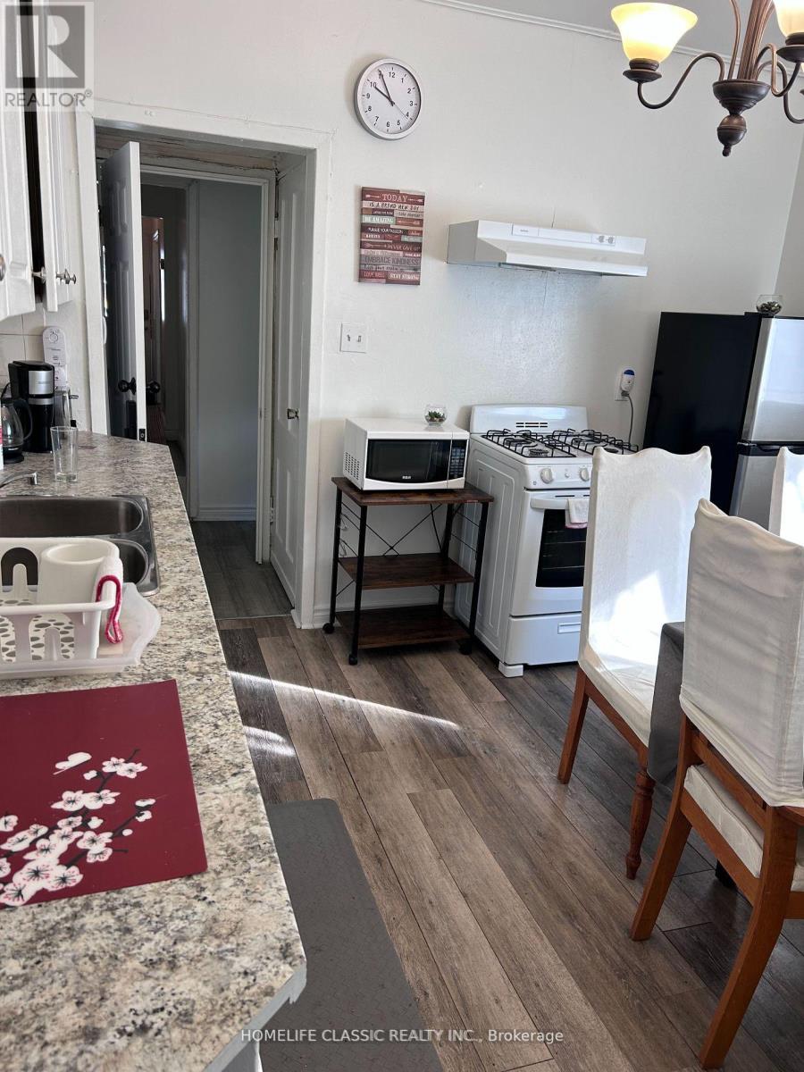 3223 Dundas Street, Toronto, Ontario  M6P 2A2 - Photo 2 - W12087953