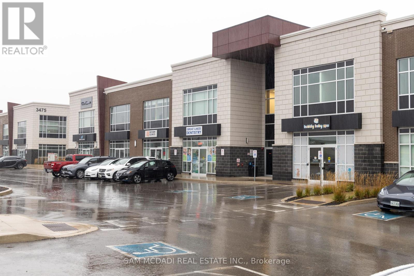 202 - 3465 Rebecca Street, Oakville, Ontario  L6L 5G8 - Photo 1 - W12088154