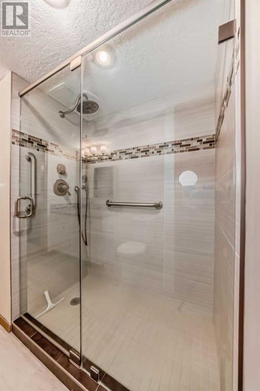 111, 7239 Sierra Morena Boulevard Sw, Calgary, Alberta  T3H 3L7 - Photo 19 - A2197548