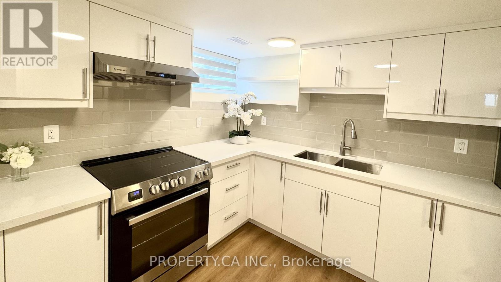 Lower 1 - 60 Lightwood Drive, Toronto, Ontario  M9V 2Z2 - Photo 1 - W12088983