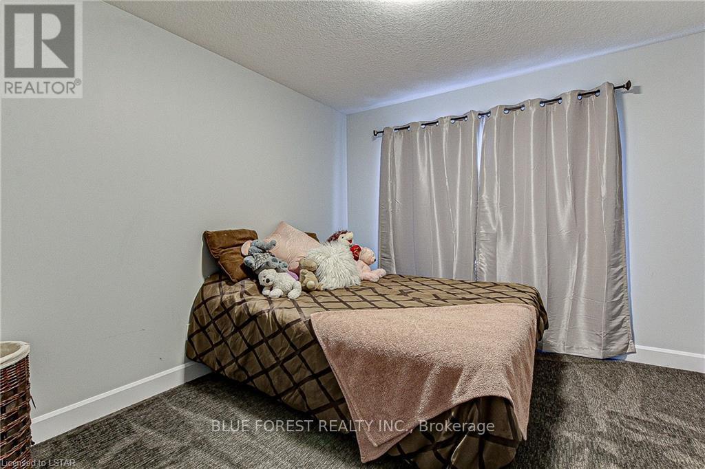 48 Woodland Walk, Southwold, Ontario  N5P 3T2 - Photo 18 - X12089805