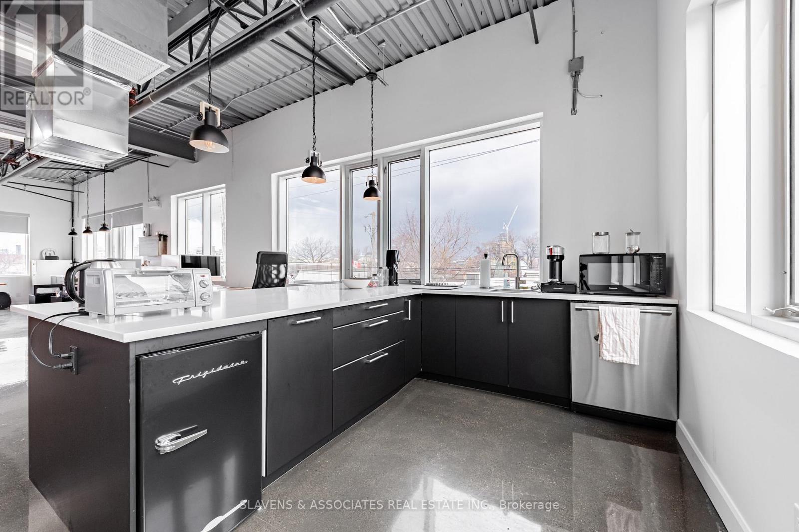 208 - 41 Industrial Street, Toronto (Thorncliffe Park), Ontario  M4G 2H5 - Photo 3 - C12089519