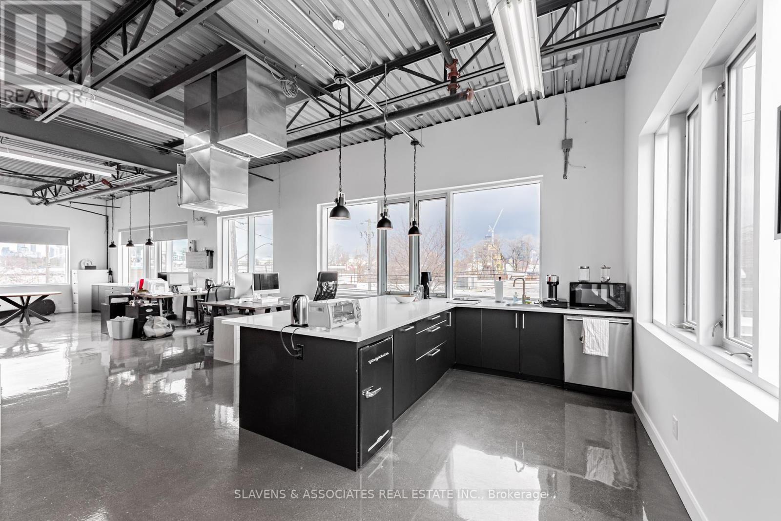 208 - 41 Industrial Street, Toronto (Thorncliffe Park), Ontario  M4G 2H5 - Photo 4 - C12089519