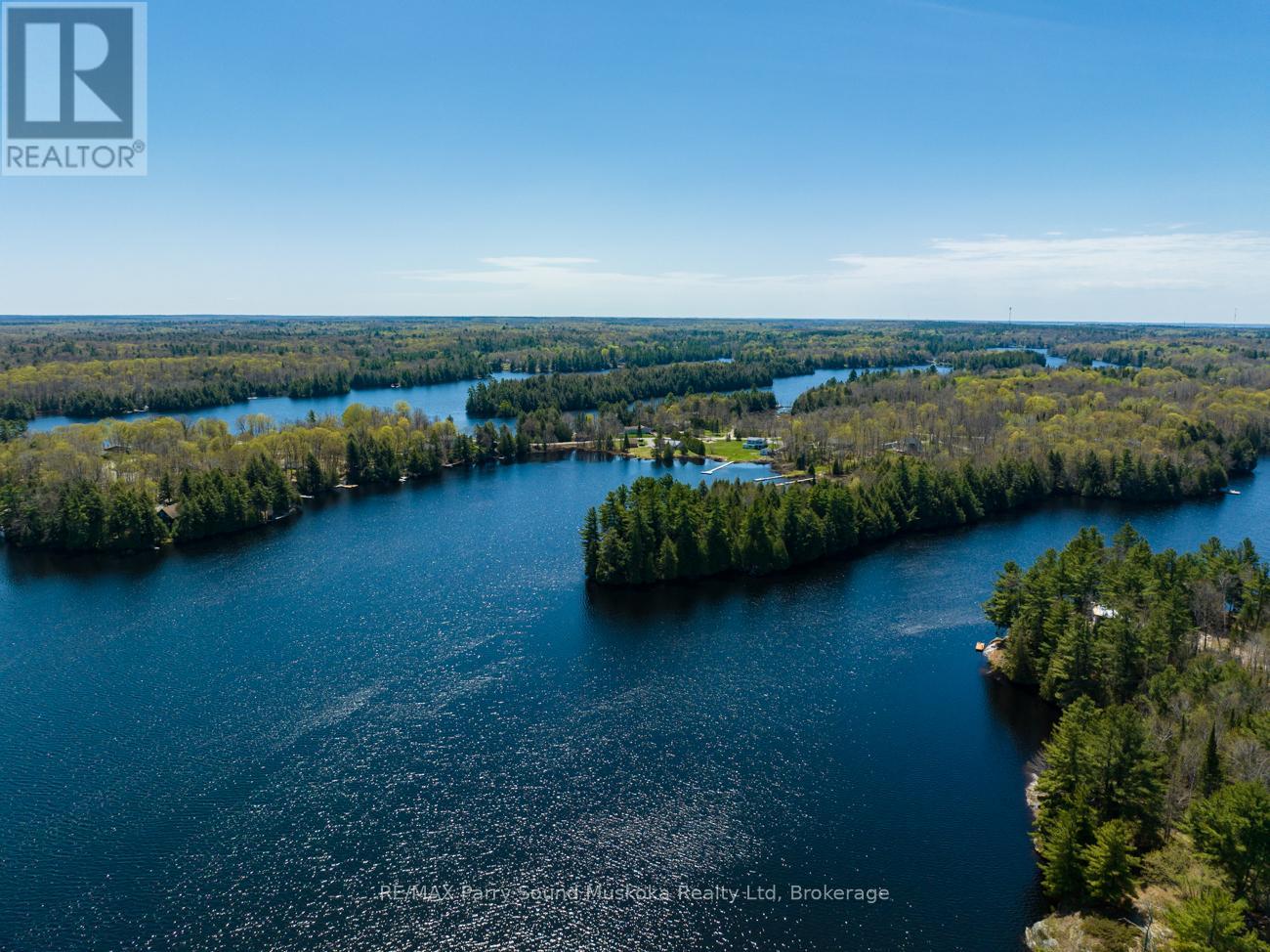 31 Pauls Bay Road, Mcdougall, Ontario  P2A 2W7 - Photo 3 - X12091558