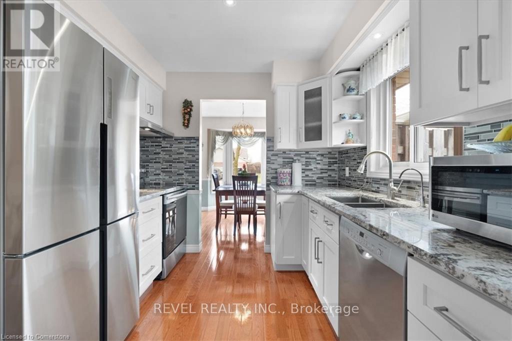 7994 Oakridge Drive, Niagara Falls, Ontario  L2H 2W1 - Photo 11 - X12091521