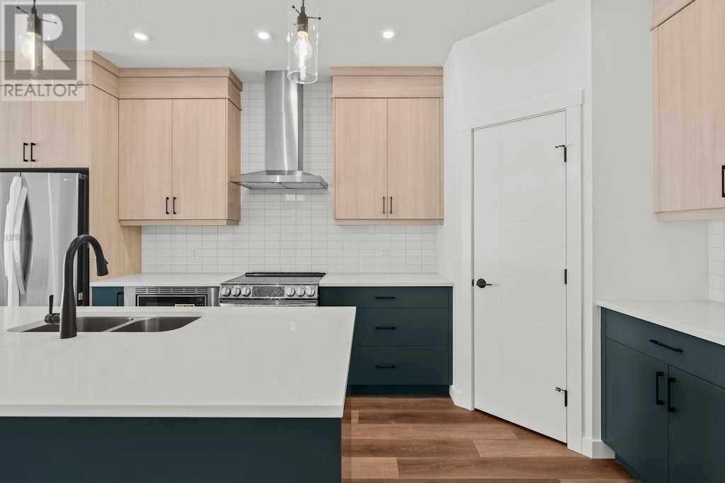 48 Rowmont Common, Calgary, Alberta  T3L 0L3 - Photo 6 - A2207368