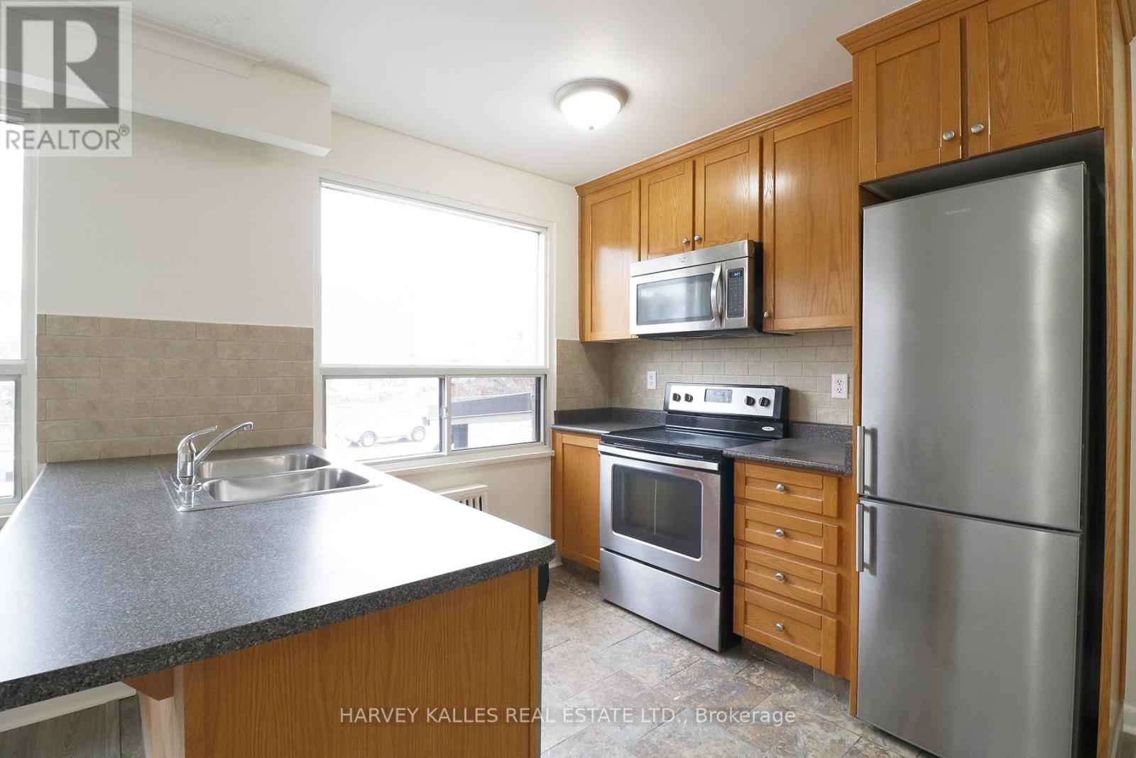209 - 500 Gilbert Avenue, Toronto, Ontario  M6E 4X5 - Photo 4 - W12092394