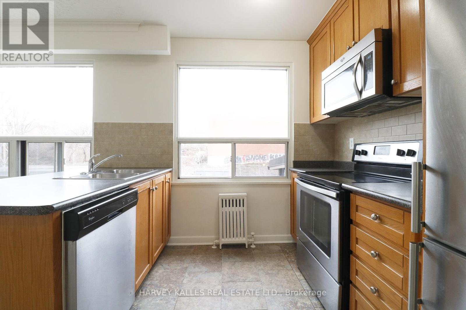 209 - 500 Gilbert Avenue, Toronto, Ontario  M6E 4X5 - Photo 5 - W12092394