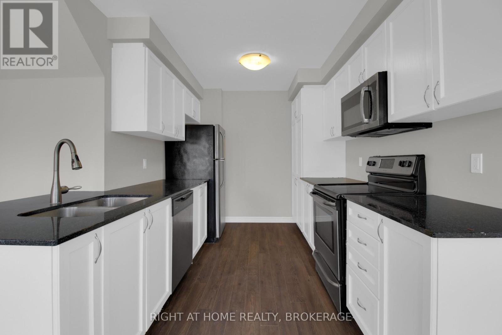 918 Apple Hill Lane, Kitchener, Ontario  N2R 0L7 - Photo 8 - X12076129