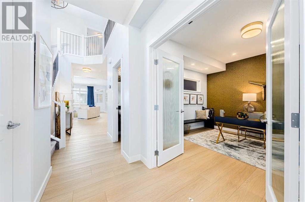 Property at 719 Buffaloberry Manor SE image 2